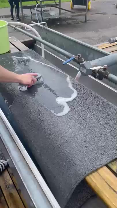 Hand-washed rug drying — clean fibres